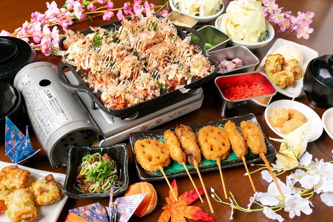 1 Day Takoyaki Making and Osaka Castle Walking Tour - Shinsekai and Tsutenkaku area: snack streets, game centers, and street vibe