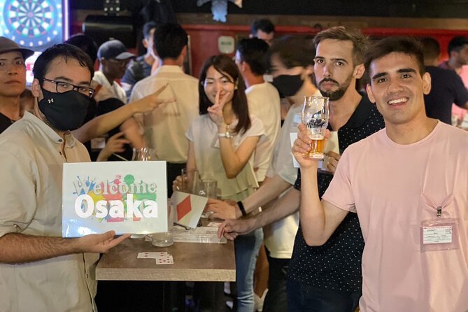 3Hour Osaka Pub Crawl Bar Hopping Nightlife Guided Tour in Namba - Stop 2: Kanemasa Liquor Store and Okonomiyaki in a Local Hangout