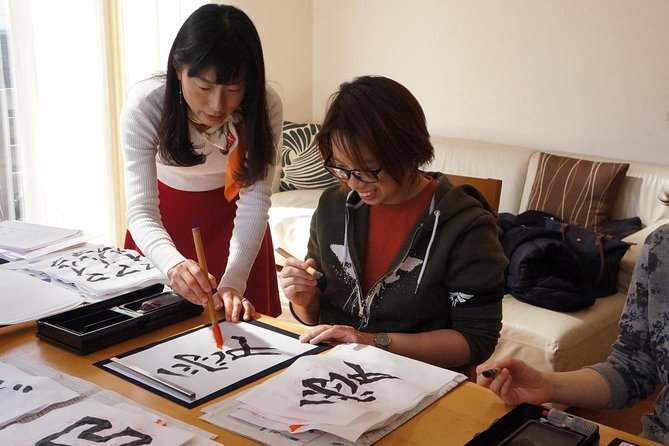 Authentic Japanese calligraphy class in Tokyo! Kanji your name - What you take home: colored paper or a fan, plus practice sheets