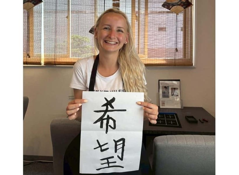 Calligraphy & print your calligraphy on a T-shirt. - Key moments you will remember