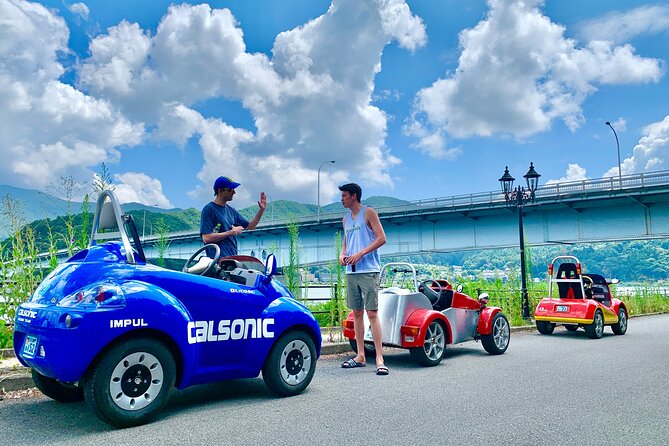 Cute & Fun E-Car tour following guide around Lake Kawaguchiko - Entering Lake Kawaguchiko by Mini EV, Not a Big Bus