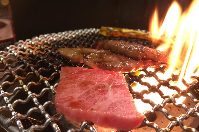 Eat, Drink & Cycle: Osaka Foodie Bike Tour - Meeting under Tsutenkaku and getting comfortable on your bike