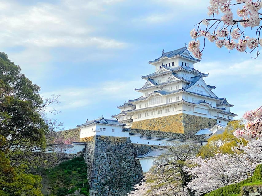 From Osaka: Himeji Castle, Arima Onsen & Mt. Rokko Day Tour - Himeji Castle in white, stone, and smart design