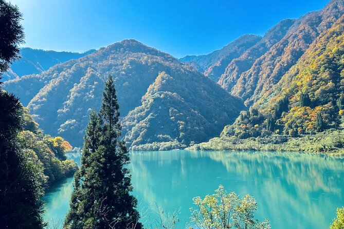 Full Day Tour to Kurobe Gorge and Unazuki Onsen from Kanazawa - Stop 3 in Unazuki Onsen: Healing Buddha, shopping time, and footbath relaxation