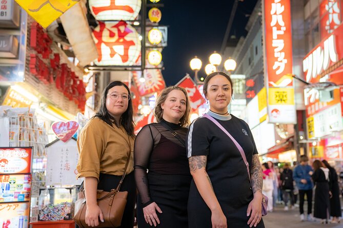 Guided Photography Tour in Osaka: Capturing Memories - Stop 1: Dotonbori Glico Sign photos that use neon, not just neon