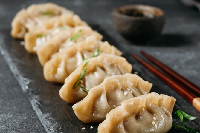 Gyoza Cooking Class in Kyoto: Traditional Japanese Dumplings - The Professional Baking Machine Moment