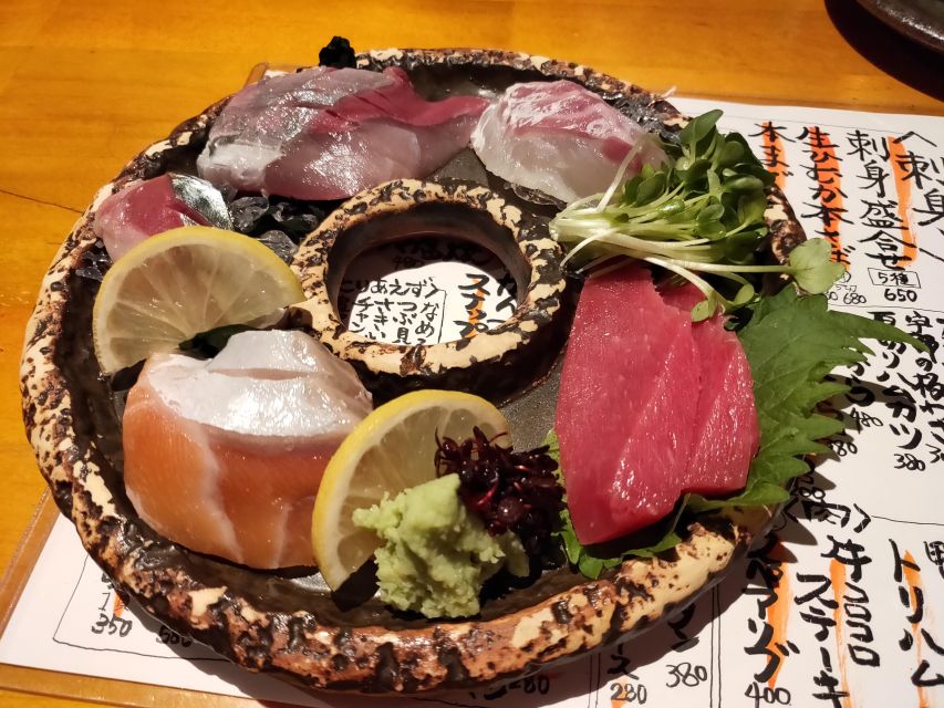 Hiroshima: Food and Culture Guided Walking Tour with Dinner - Final dinner stop on the Nagarekawa side, where Hiroshima flavor shows up