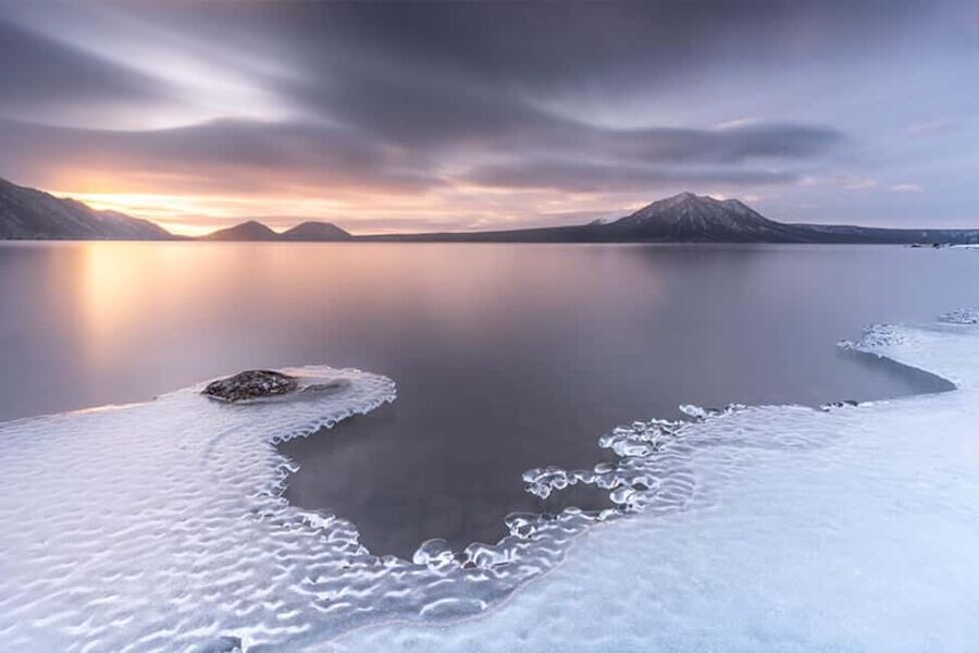 Hokkaido Tour:Sapporo to Noboribetsu, Lake Toya,Ice Festival - Shōwa-Shinzan lava dome: an active volcano view near Bear Ranch