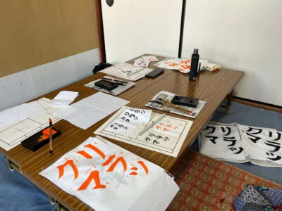 Calligraphy class at Buddhist temple in city center