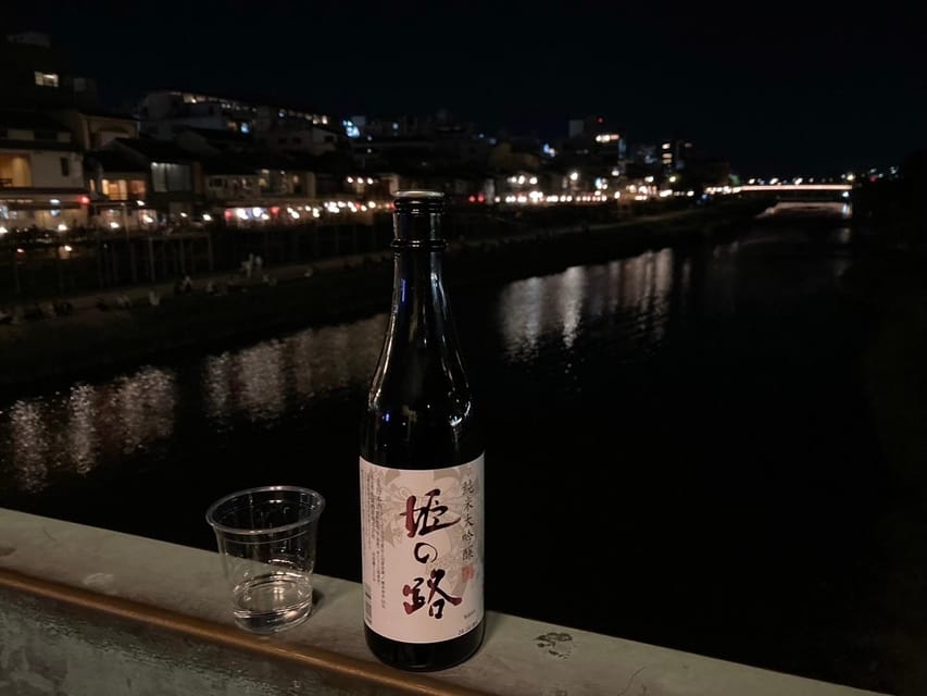 Kyoto: Gion Evening Walk with Hidden Gems, Geisha & Sake - Ninenzaka cobblestone slope feels like stepping into old Kyoto