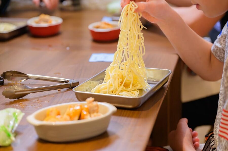 Kyoto: Ramen Cooking Class at a Ramen Factory with Souvenir - Building your bowl: soup base, oils, and the miso, salt, soy sauce mix