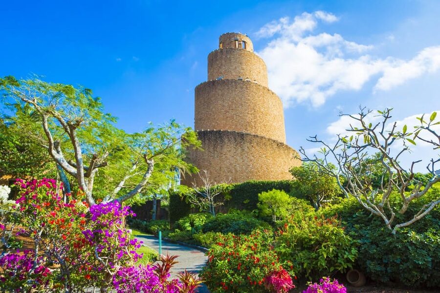Okinawa: Tropical Dream , Ryukyu Mura, Banta Cafe Bus Tour - Manza Cape and the elephant rock: scenic payoff plus a cash ticket