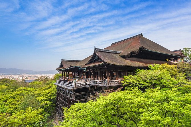 One-Day Tour of Kyoto's Highlights from Osaka/Kyoto - Stop 1: Fushimi Inari Taisha torii gates and the meaning behind the red