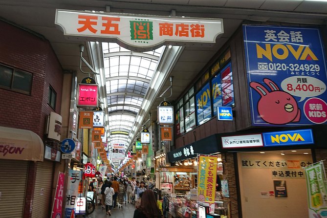 Osaka Castle & Dotonbori Lively One-Day Walking Tour - Osaka Castle: moats, stone walls, and the samurai story thread