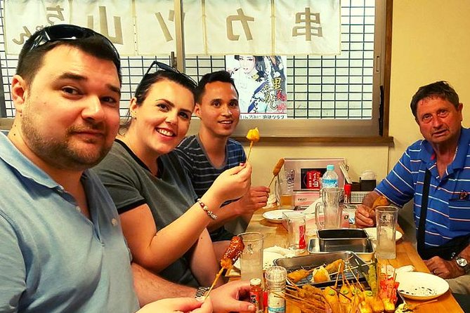 Osaka Food Tour: 13 Dishes at 5 Local Eateries - Stop style inside five local eateries