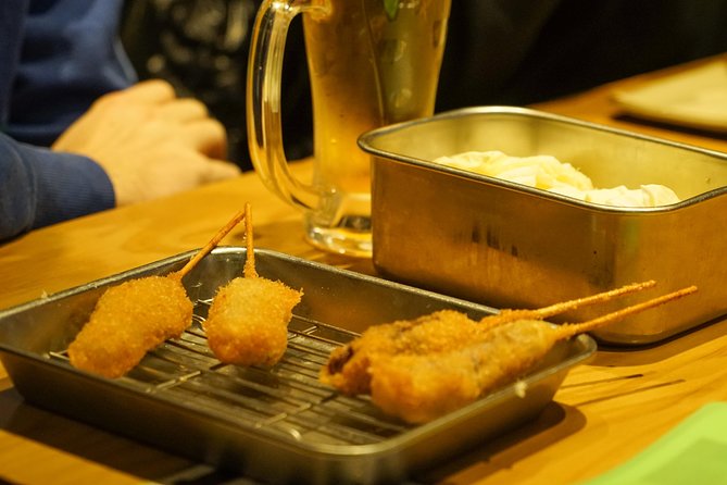 Osaka Local Foodie Walking Tour in Dotonbori and Shinsekai - Shinsekai to Dotonbori: where Osaka feels most like Osaka
