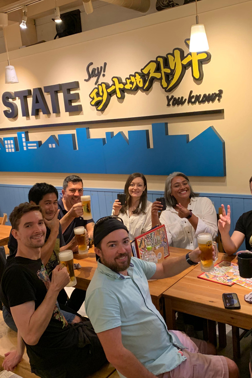 Osaka: Namba Pub Bar Crawl with a Local Guide - Entering Namba at night, with a plan that feels local