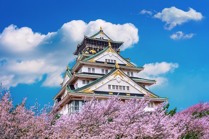 Osaka Private Food Tours by Local Foodies: 100% Personalized - Stop 5: Retro neighborhood, Tsutenkaku glow, and a beer with skewers