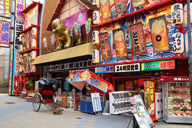 Osaka Private Pop Culture Tour: Historic Tenma to Dotonbori - Retro neon energy: fried skewers, bold signs, classic Osaka