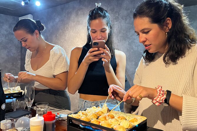 Osaka Sake Tasting & Takoyaki Cooking Experience - Eating what you make, with sake after the cooking