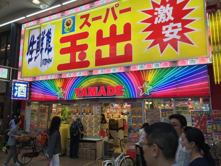 Osaka: Small Group, Big Flavors & Hidden Local Secrets Tour - Entering Osaka After Dark in Tenma’s Nostalgic Lanes