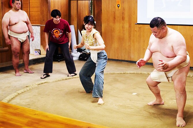 Osaka Sumo Experience with Live Show and Audience Challenge - Audience Challenge: Practicing Moves and Facing a Wrestler