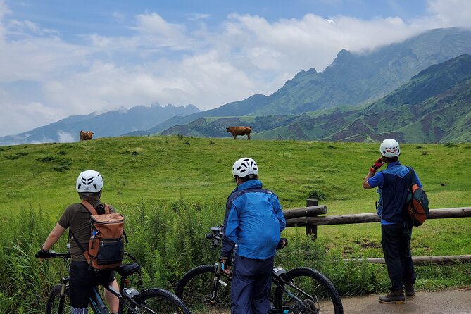 Private E-MTB guided cycling around Mt. Aso volcano & grasslands - Starting at Aso Station, then learning the volcano first
