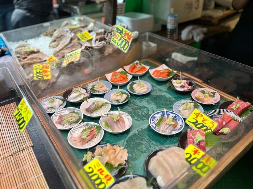 Private Toyosu & Tsukiji Market Adventure with Tuna Auction - Tsukiji Outer Market: where snacks turn into a shopping mission