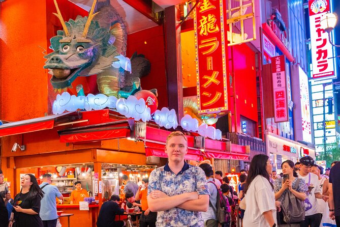 Private Vibrant Night Photoshoot Experience in Osaka (Dotonbori) - How Mina turns awkward posing into natural photos