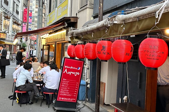 Shimbashi Tastes & Stories A Culinary Foodie Tour By Local Guide - New Shimbashi Building and the Tanuki Alley Story