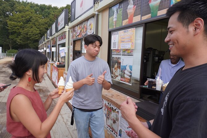 Shinjuku: Private Bar Hopping - Hanazono Shrine at night: a lit-up break from the bar scene