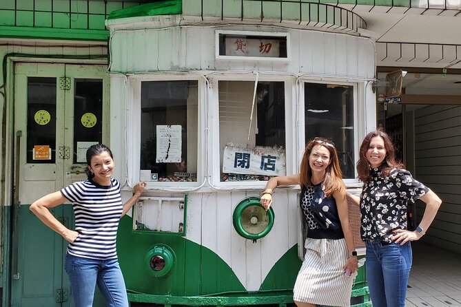 Taste Local Life: Nagasaki's Historical Street Walking Tour - Motenashiya near Megane Bridge: maps, souvenirs, and a useful break