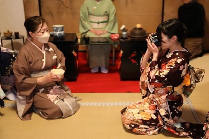 Tea Ceremony in 150 Years Old Townhouse with Tables and Chairs - What the guides are doing, and why English matters