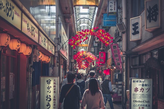 The Dark Side of Osaka Walking Tour - Shinsekai: the “New World” intro and the arcade vibe