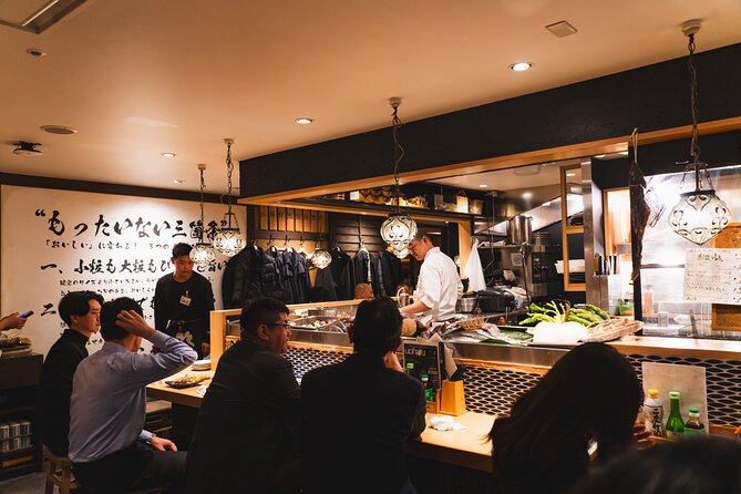 Tokyo Ginza Authentic Food Tour (Izakaya Hopping by local guide) - Ginza Mitsukoshi photo stop: quick landmark time without slowing the meal