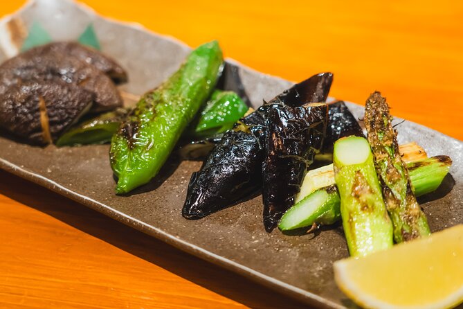 Tokyo Ginza Authentic Food Tour (Izakaya Hopping by local guide) - The hole-in-the-wall izakaya alley under the train tracks