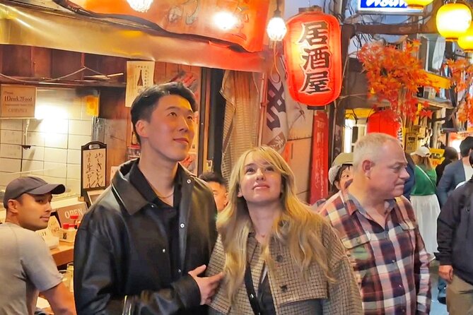 Tokyo: Shinjuku Bar Hopping & Night Walking Tour - Kabukicho: neon chaos, entertainment energy, and a second izakaya stop