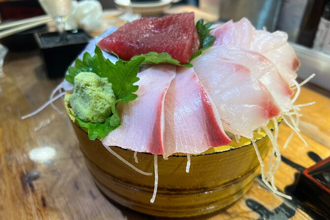 Tokyo: Shinjuku Food Tour (13 Dishes at 4 Local Eateries) - Stop 1: Omoide Yokocho, tiny izakayas and the smell of grilled comfort