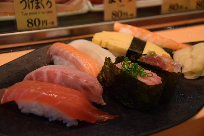 Tokyo: Tsukiji Fish Market Food and Culture Walking Tour - The outer market walk: how a guide turns crowd chaos into a route