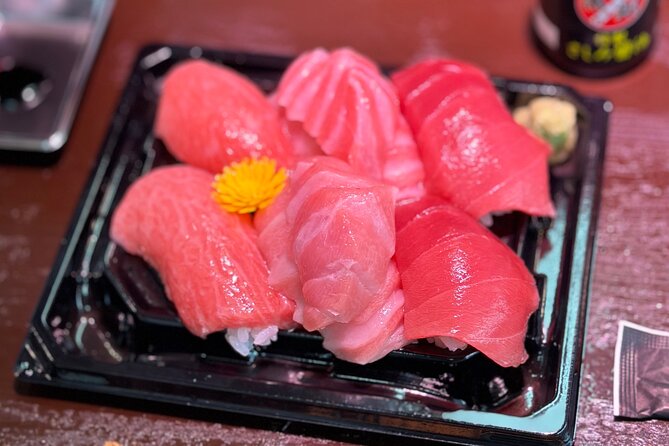 Tokyo: Tsukiji Fish Market Food and Walking tour - Stop 1, Tsukiji Hongwanji Temple: a quiet reset before the market