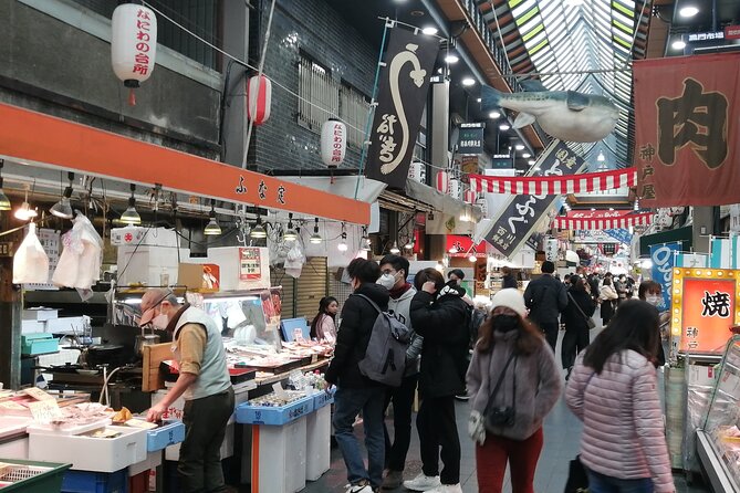 Walking Tour of Osaka's 5 Must-See Sights, with Ramen for Lunch - Kuromon Market: ramen lunch today, street snacks next
