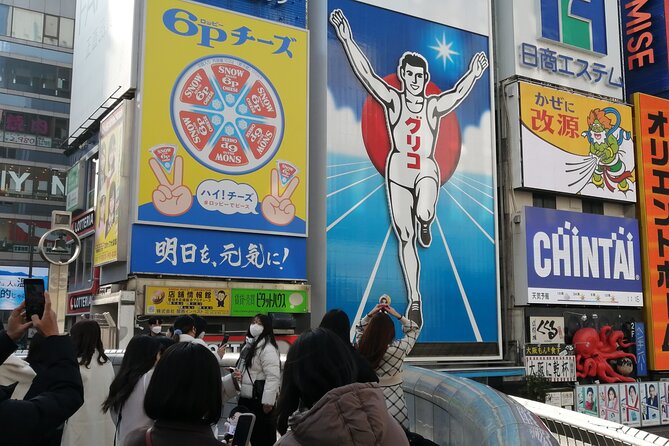 Walking Tour of Osaka's 5 Must-See Sights, with Ramen for Lunch - Dotonbori: neon downtown and the Glico photo moment